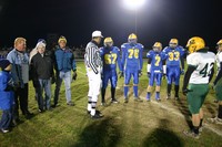 Coin toss commerating the 40th East West Game. Coin toss commerating the 40th East West Game.